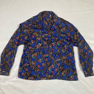 Vintage 100% silk button up blouse with Versace inspired design. Size 4.